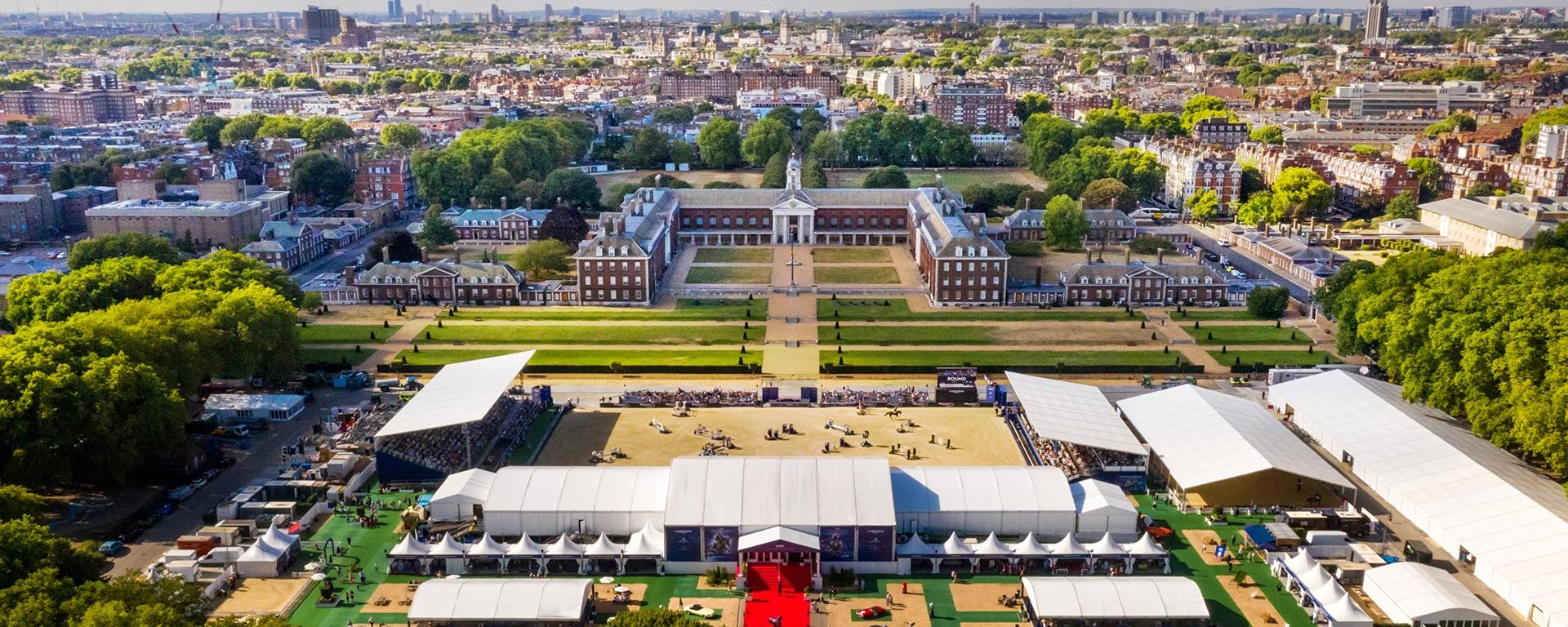 Ariel photography overlooking the South Grounds at Royal Hospital Chelsea, with huge pavilions and show jumping grounds set out below